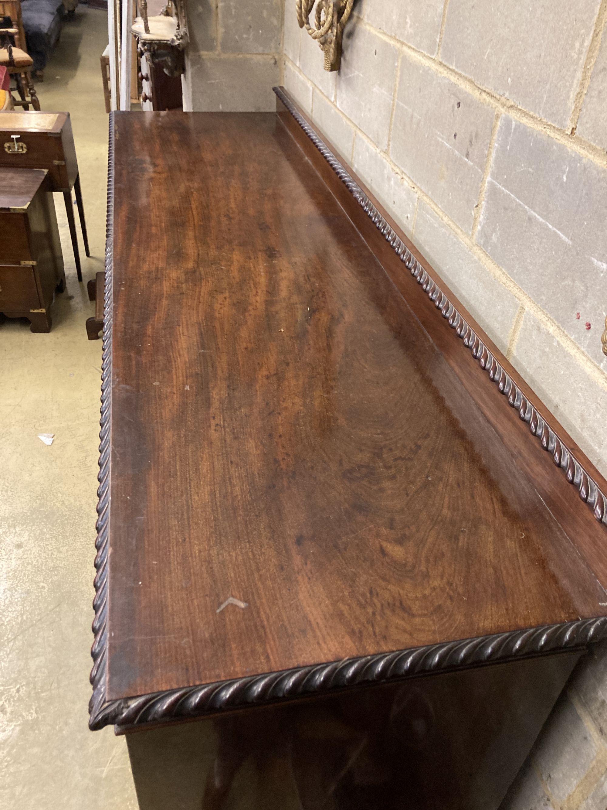 A late 19th/early 20th century Chippendale revival mahogany buffet, length 220cm, depth 61cm, height 100cm